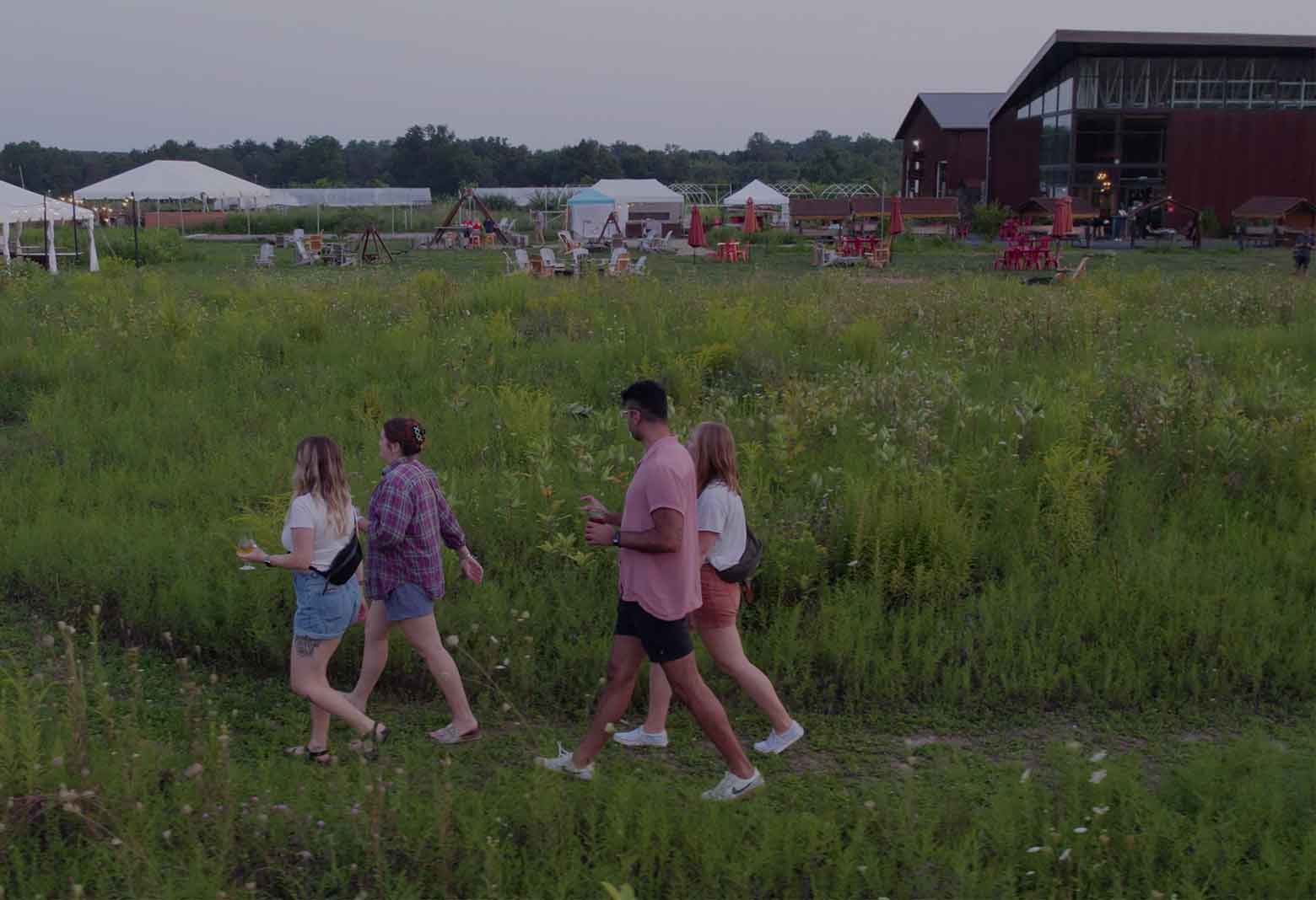 People walking a trail at River St. Joe.